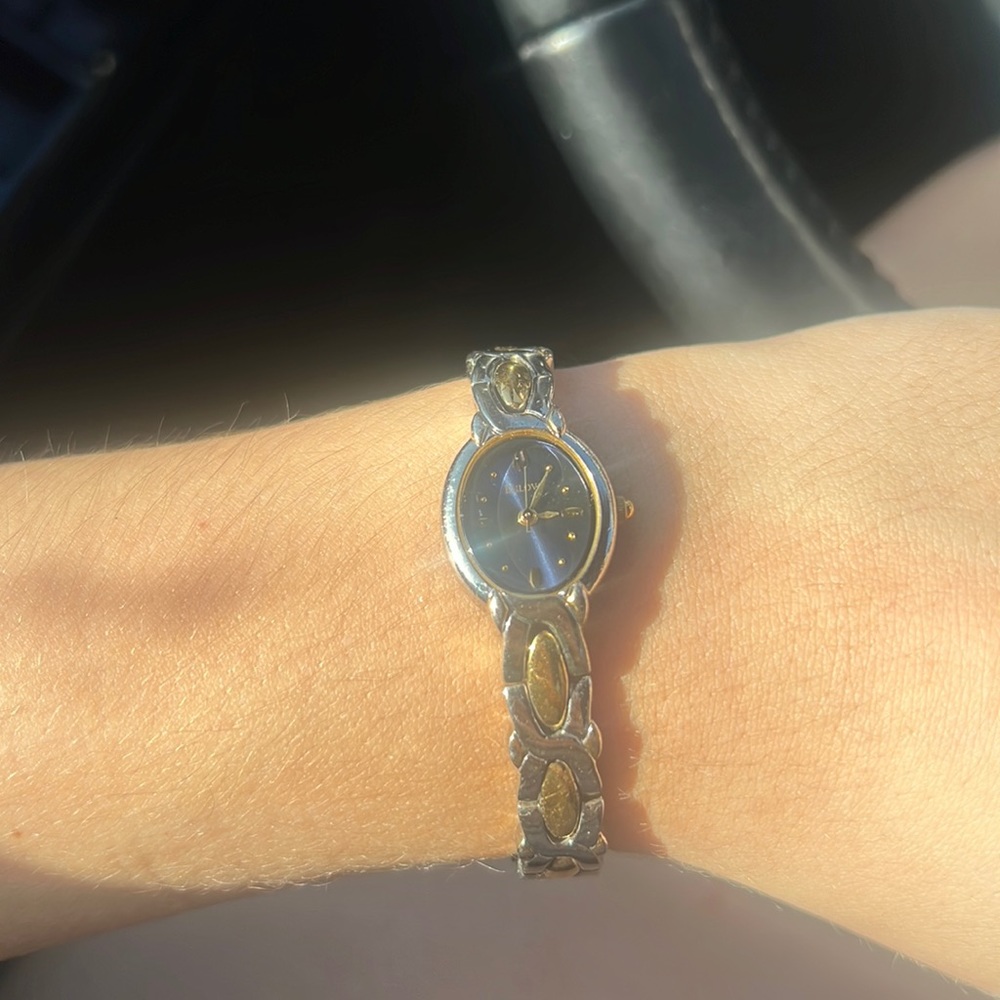 Selling a Bulova women’s watch.  Band is gold and silver colored.